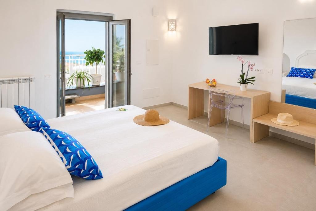 Bright Terrazza del Sole bedroom opening onto the terrace